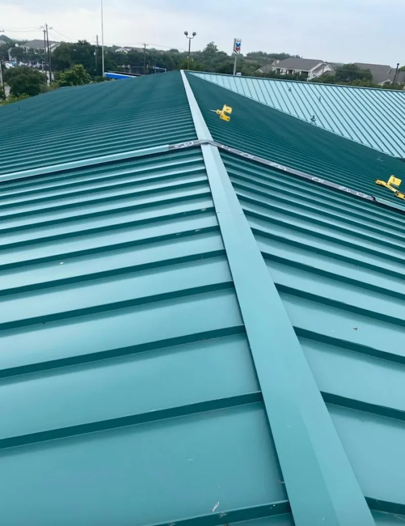 Green commercial metal roof ridge and valley for Metal Roof Repair in Florence